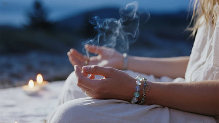 Calming bracelet glowing under moonlight during meditation”]