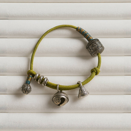 Six-Word Mantra Tibetan Bell Green Thread Bracelet – Peace & Vitality