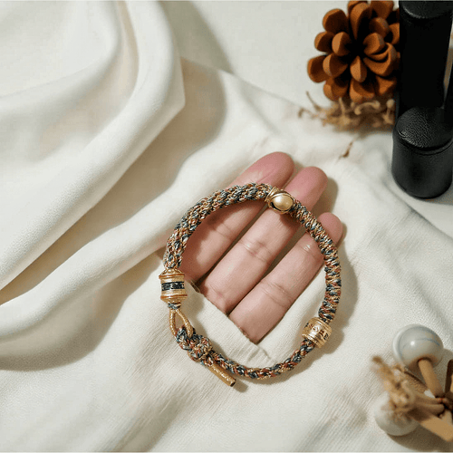 Six-Word Mantra Tibetan multicolor braided bracelet with golden accents, symbolising protection and blessings, ideal for work mode energy.
